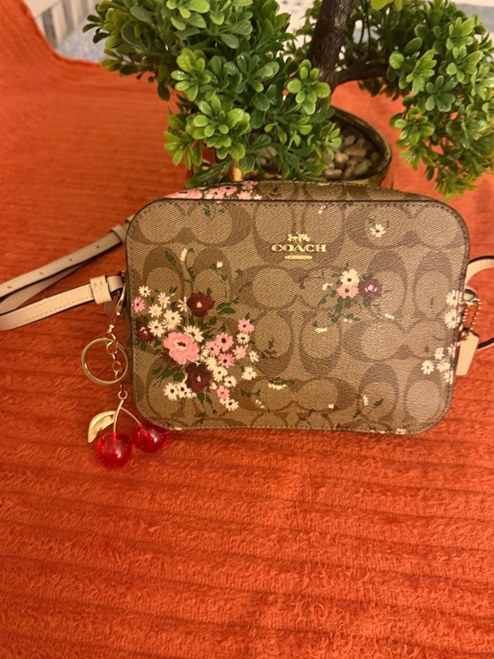 COACH Brown Floral Signature Canvas Crossbody Bag
